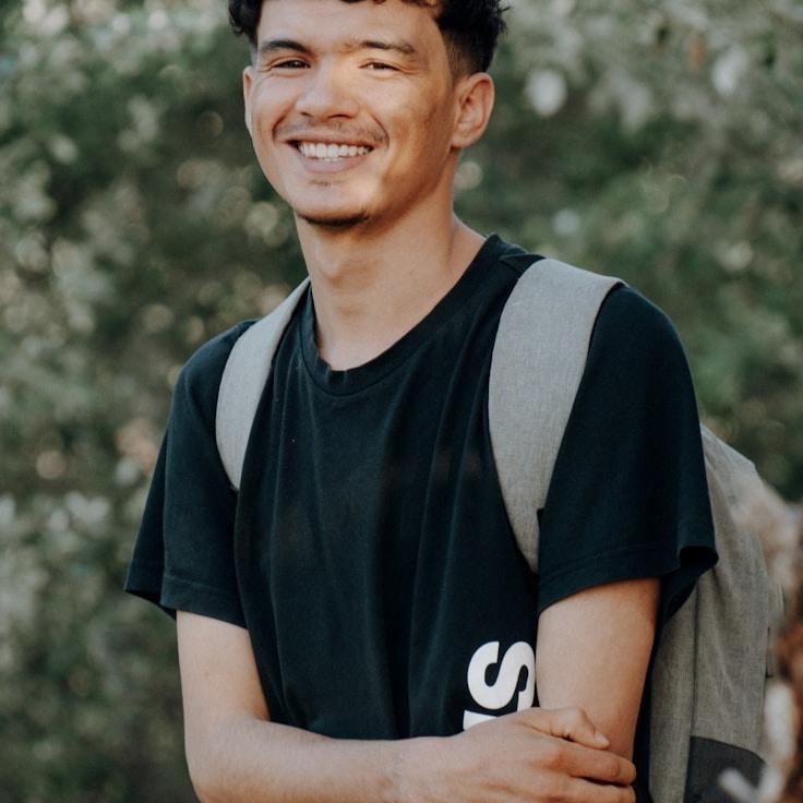 A representative reviewing corporate floral arrangements